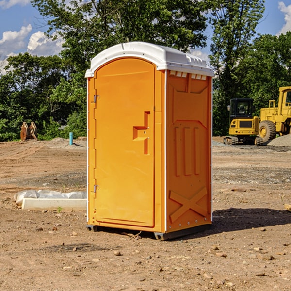 how often are the portable restrooms cleaned and serviced during a rental period in White Cloud Michigan